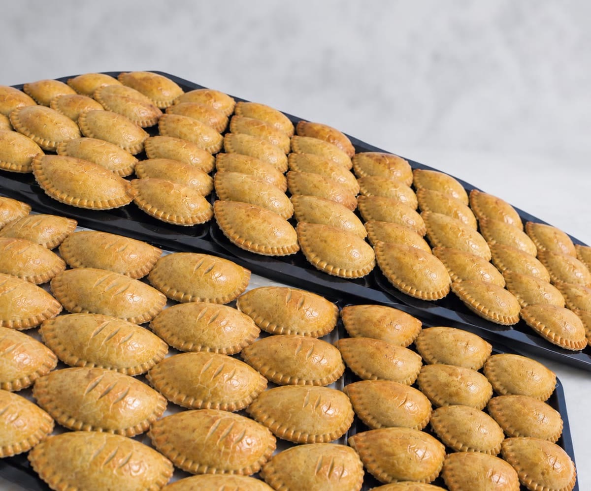 Tray of golden meat pies