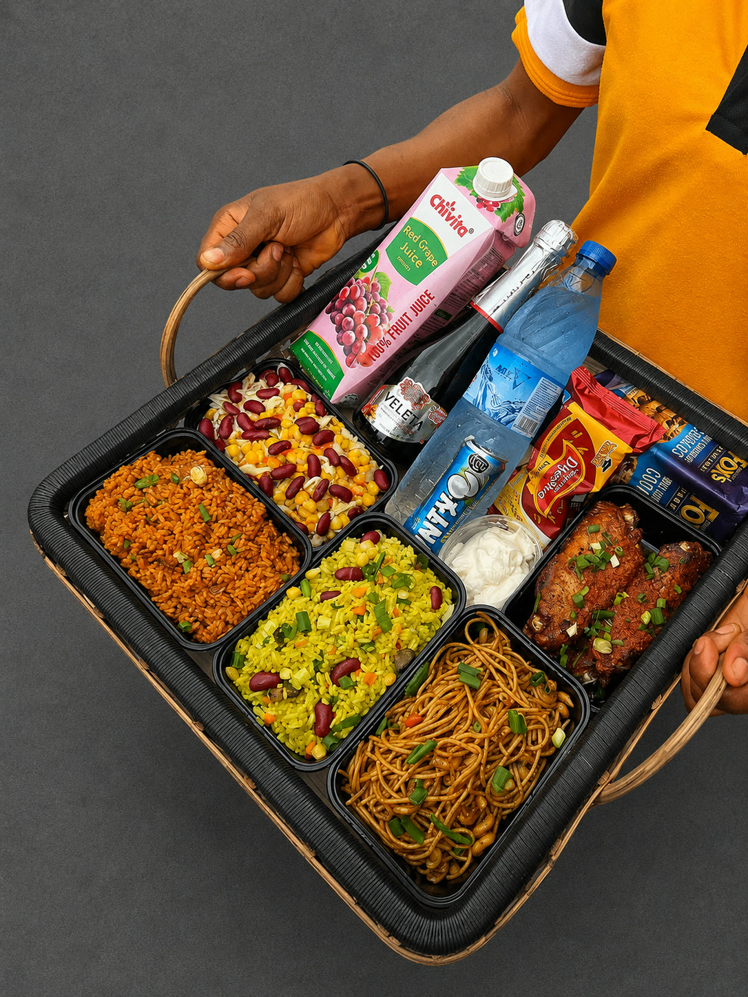 Basket tray with rice, noodles, chicken, drinks and snacks